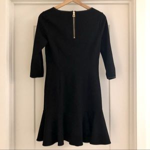 Sail to Sable Black Long Sleeve Ruffle Hem Dress
